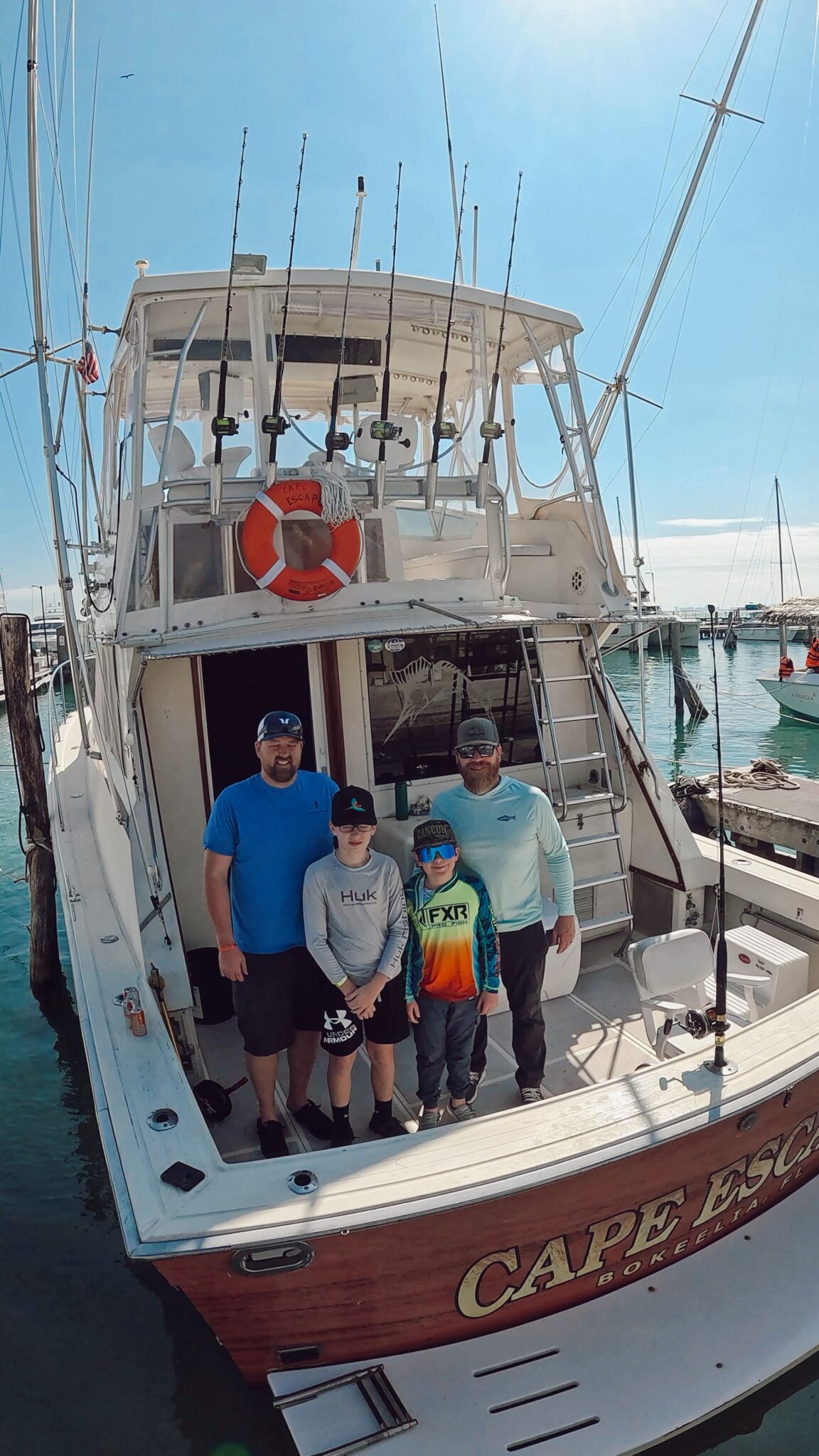 Family with a wahoo caught on Cape Escape