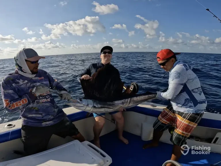 Anglers with a sailfish before release